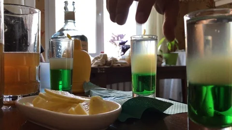 Bartender preparing green mexican cocktail Stock Footage 105923940