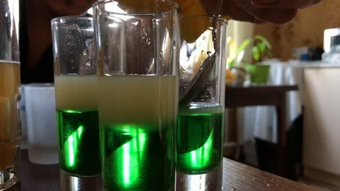 Bartender preparing green mexican cocktail Stock Footage 106575194