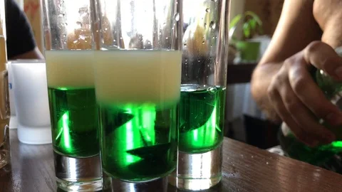 Bartender preparing green mexican cocktail Stock Footage 106575197