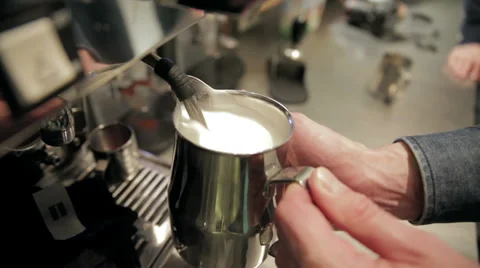 A bartender, preparing hot milk Stock Footage 37085616