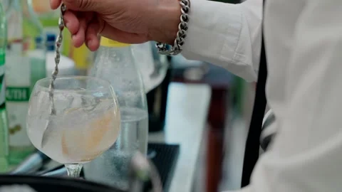 Bartender Preparing Lemon Gin Cocktail Video stock 299563623