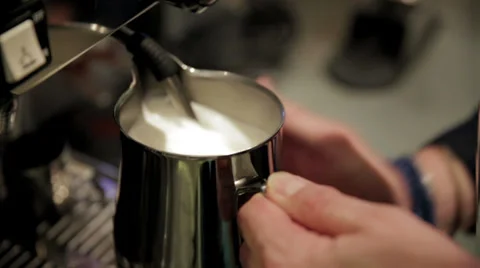 A Bartender preparing milk Stock Footage 37096933