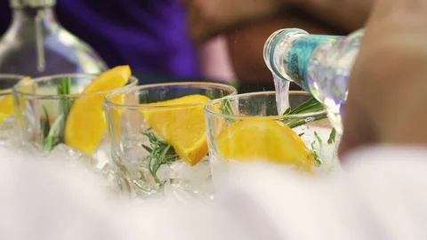 Bartender preparing, pouring refreshing alcohol drink with bubbles Stock Footage 128818717
