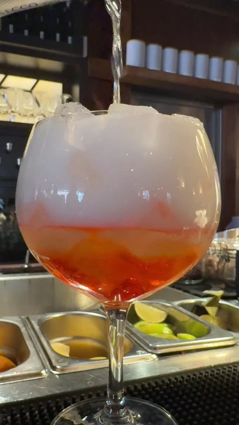 A bartender is preparing sparkling cocktail Stock Footage 311008287