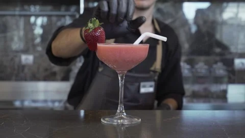 Bartender preparing strawberry drink Stock Footage 167588811
