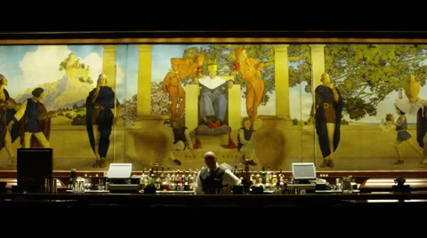 Bartender preparing at vintage bar with beautiful painting in background Vidéo 56887566