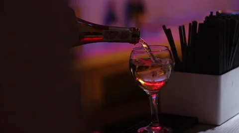 Bartender puring glass of wine Stock Footage 57660932