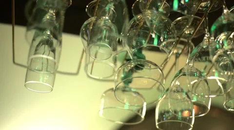 Bartender puts glasses hanging in the bar Stock Footage 61795163