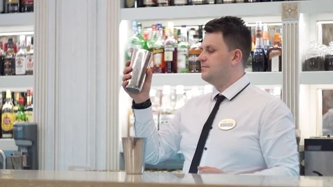 Bartender puts ice in the shaker 1 Stock Footage 101968464
