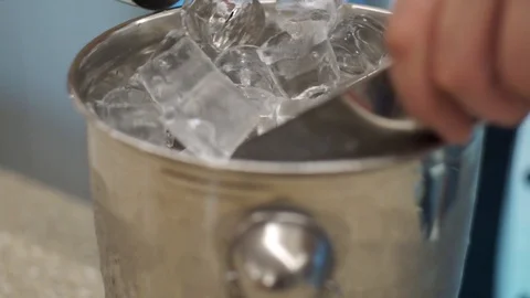 Bartender puts ice in the shaker, close up panning Stock Footage 101968218