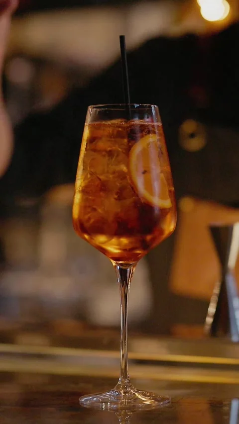 Bartender Puts Straw Into Ready Made Cocktail. Video stock 295542344