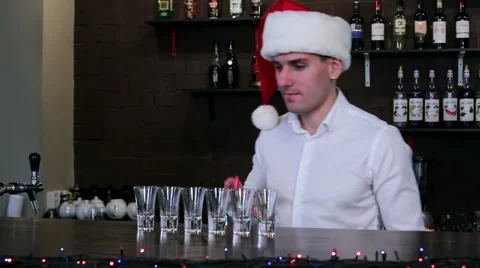 The bartender in the Santa hat Stock Footage 58033662