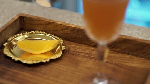 Bartender serves blood and sand cocktail 1 Stock Footage 101968682