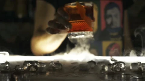Bartender serves cocktail at bar Stock Footage 114366462