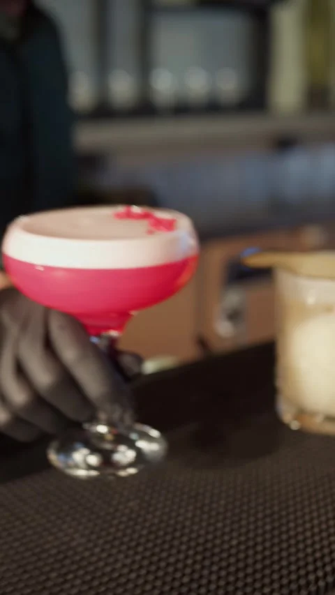 The bartender serves a cocktail to the visitor. Stock Footage 271201227