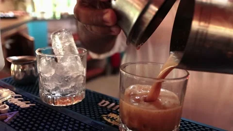 Bartender serving a carajillo coffee alchoholic drink in bar Stock Footage 155024539