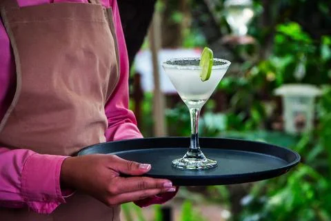Bartender Serving Fresh Lime Cocktail On Outdoor Tray Stock Photos