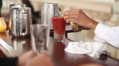 Bartender serving nasty looking drink cu Stock Footage 18309774
