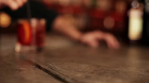 Bartender serving negroni to customer Stock Footage 63297658