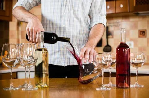 Bartender Serving Red Wine Foto stock
