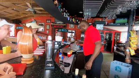 Bartender Serving Tropical Frozen Drinks Video stock 94839358