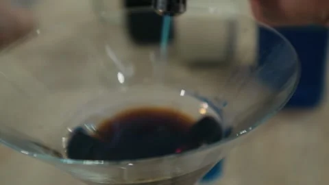Bartender sets fire to cocktail, burning cinnamon in alcohol drink Stock-Footage 134031285