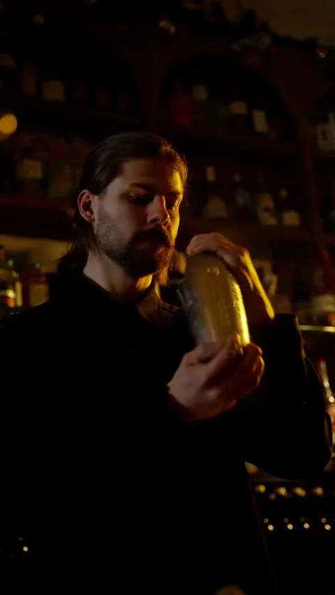 Bartender with Shaker Preparing Cocktail Stock Footage 262652950