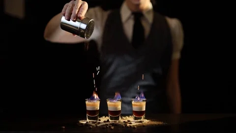 Bartender sparkling B-52 cocktail Stock Footage 126610979
