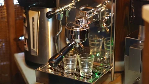 Bartender starts to prepare a double espresso Stock Footage 73938853