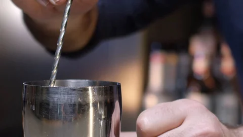 Bartender stirring the cocktail Stock Footage 129084479
