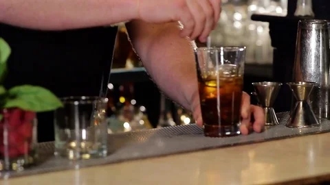 Bartender Stirring a Craft Cocktail Stock Footage 78624307