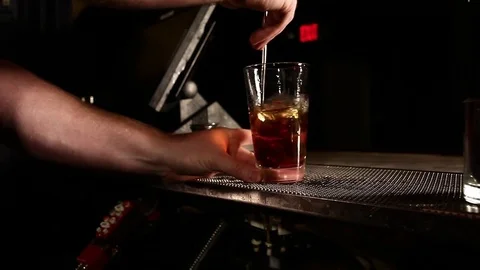 Bartender Stirring a Mixed Drink Stock Footage 78624204