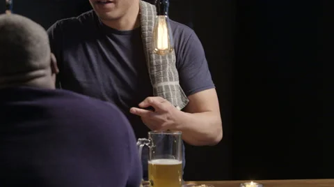 Bartender talking with a customer Video stock 62936618