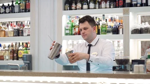 Bartender throws shaker with tomato juice Stock Footage 101966726
