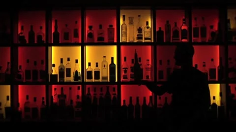 Bartender is tossing bottles 動画素材 8534396