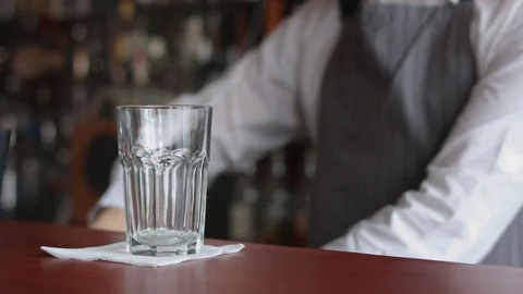 Bartender turns the ice with spoon Stock Footage 74218041