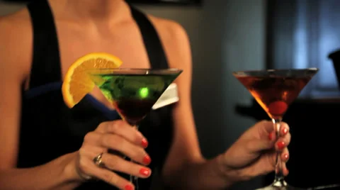 Bartender waitress prepares two drinks Stock Footage 33046287