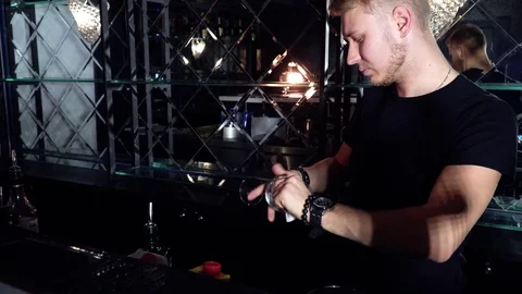 The bartender wipes the glasses Video stock 85129659