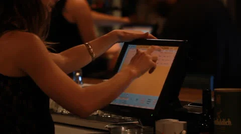 Bartender woman typing on computer   Stock Footage 23053535