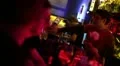 Bartenders in night club bar are serving drinks for visitors HD Footage