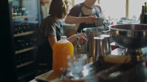 Bartenders prepare drinks at a party Stock Footage 67532137