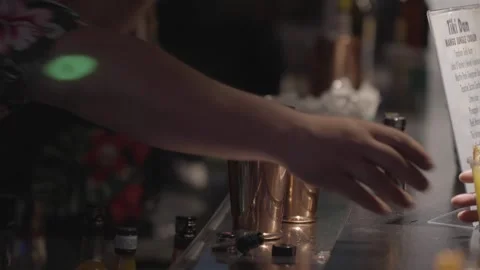 Bartenders serving drinks side view Stock Footage 308415110