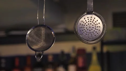 Bartender's tool for making cocktails. strainer, a good tool for the job. Stock Footage 243462522