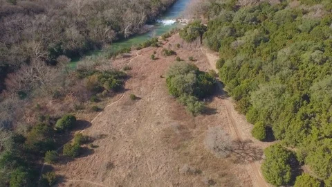 Barton Creek Austin Texas streaming waterfall drone moving over waterfall while  Stock Footage 101391795