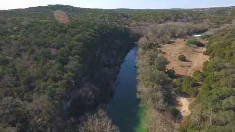 Barton Creek Austin Texas streaming waterfall descending over waterfall and cree Stock Footage 101498931