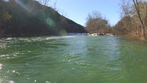 Barton Creek Austin Texas streaming waterfall drone is moving up stream over wat Stock Footage 101668511