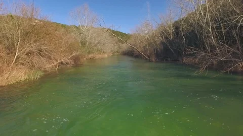 Barton Creek Austin Texas streaming waterfall drone is moving down stream low ov Stock Footage 101700810