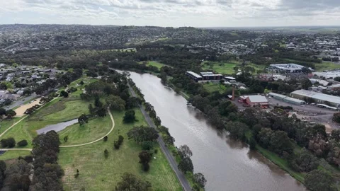 Barwon River Winding Through Green Parkland and Urban Geelong Stock Footage 347839918