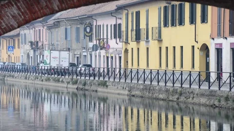 BAS 1110through a bridge over the Milan Naviglio with the traffic Stock-Footage 83897828