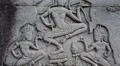 Bas-relief on the ancient wall in Angkor Thom temple complex in Cambodia HD Footage